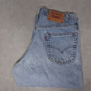 1990's Levi's 550 Blue Jeans Men's 30x32 Relaxed Fit Light Washed Faint Spotting